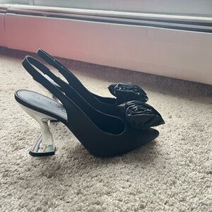 Katy Perry. New without tags. Black Slingback Heels with Silver Heel. Size 7.5
